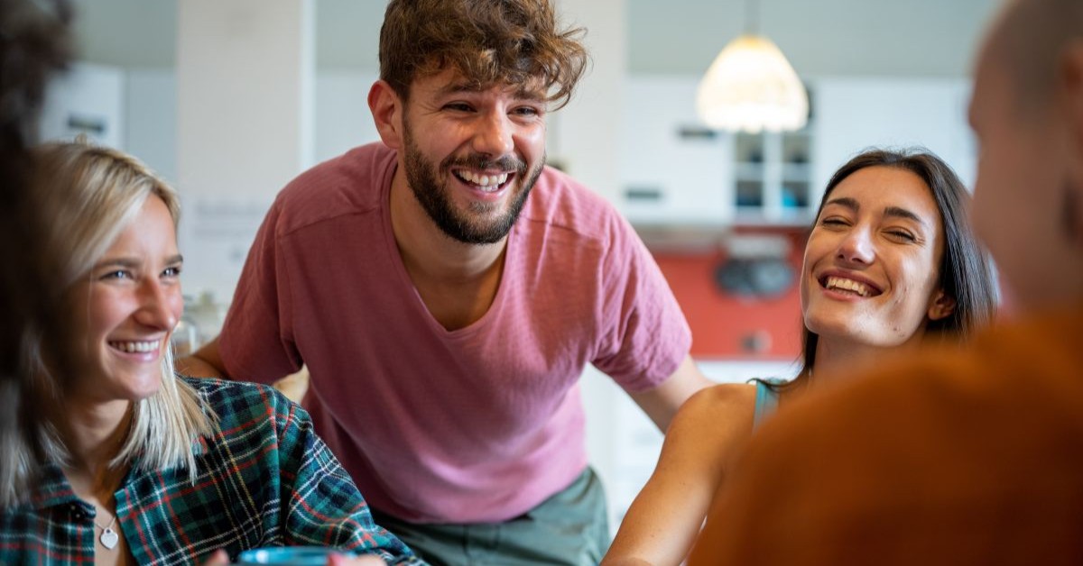 3 young people having a fun conversation discussing how accessible Lamplight is